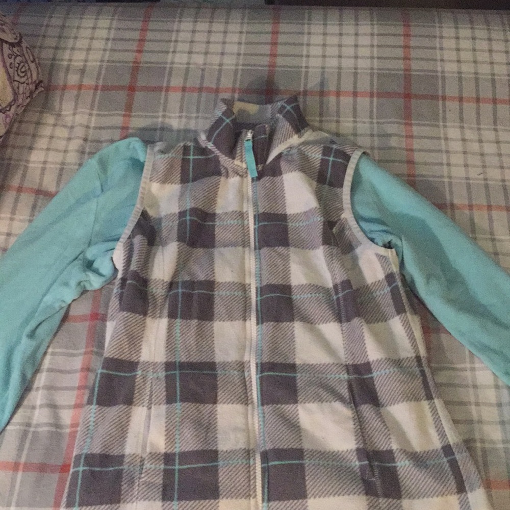 this vest with a teal shirt